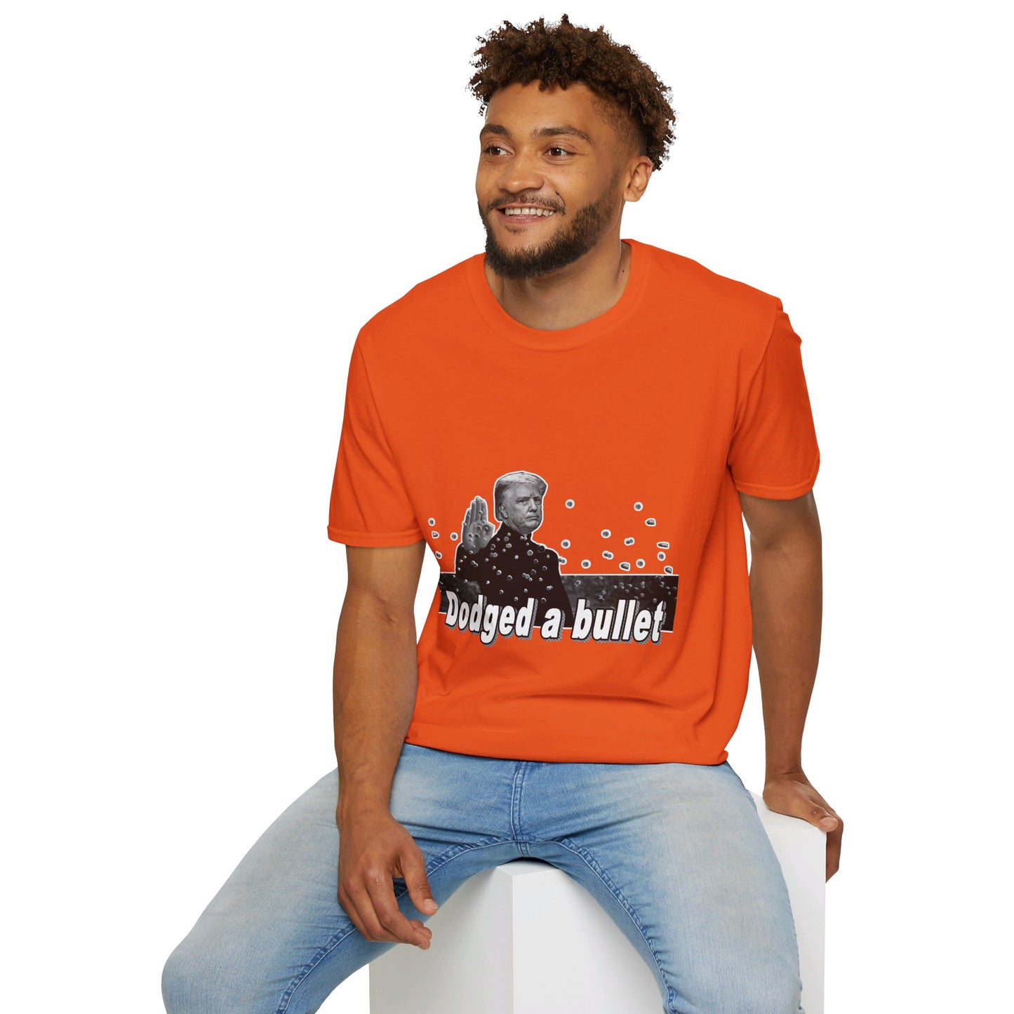 Trump Dodged a Bullet Unisex T-Shirt